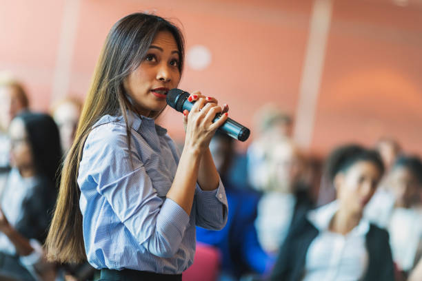 istock Female business presenter 972367274