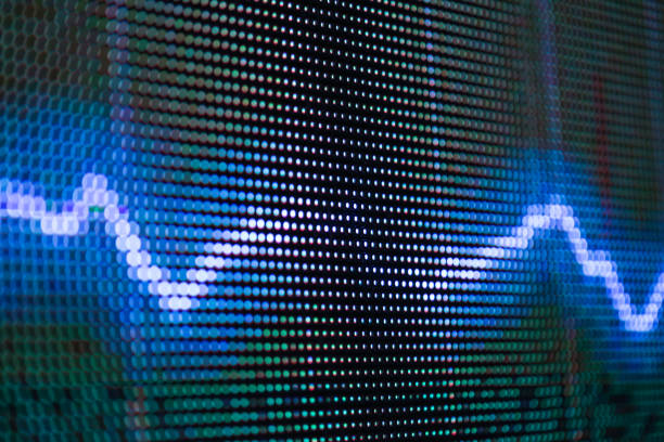 istock stock chart trend line in big LED screen 972369538