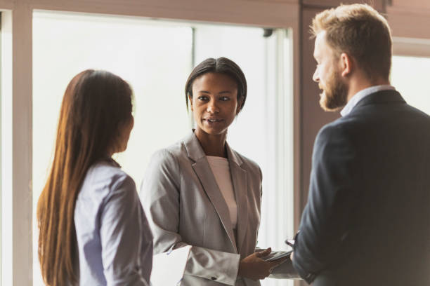 istock Business people attending a meeting 972371978