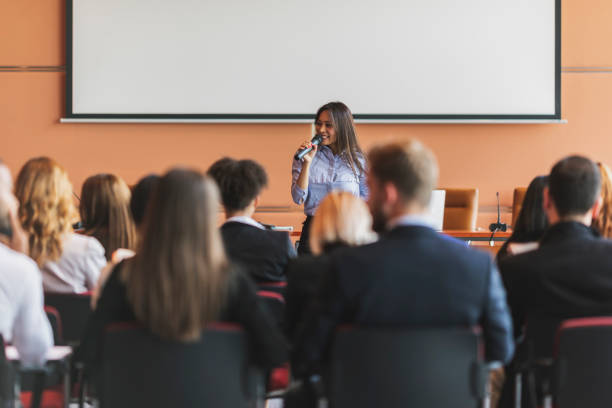 istock Female business presenter 972374470