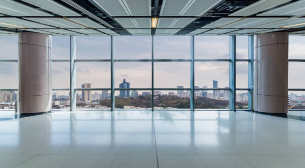 istock Panoramic skyline and buildings from glass window 972374724