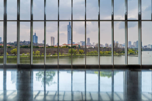 istock Panoramic skyline and buildings from glass window 972379542