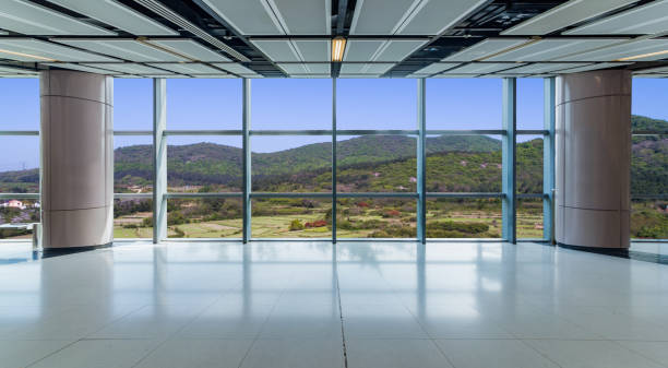 istock Panoramic skyline and buildings from glass window 972384282