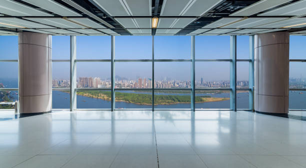istock Panoramic skyline and buildings from glass window 972384382