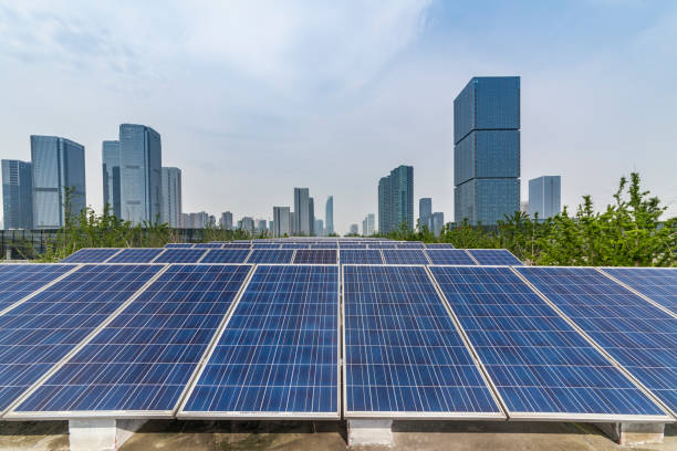 istock Solar and modern city skyline 972393840