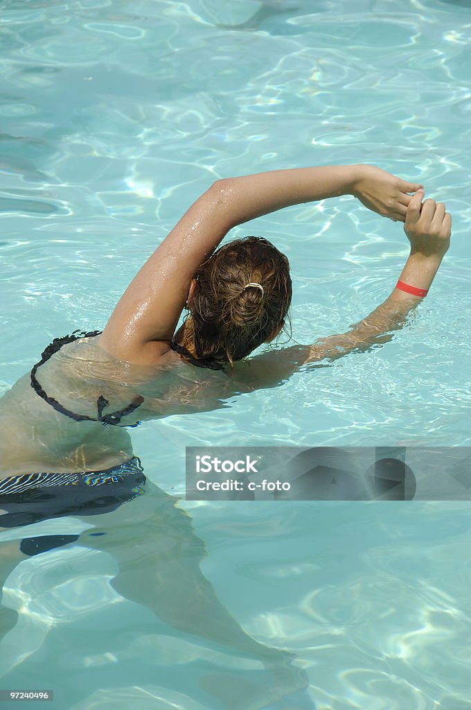 Girl in pool  Active Lifestyle Stock Photo