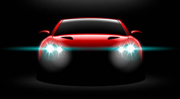 istock realistic red sport car view with unlocked headlights in the dark 972420146