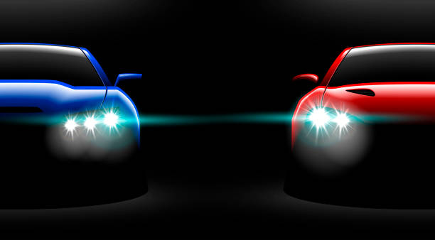 istock realistic red blue two sport car view with unlocked headlights in the dark 972420168