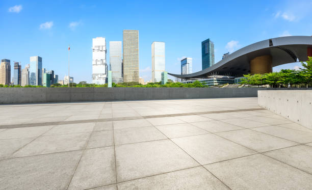 istock Empty square floor and modern city commercial buildings in shenzhen 972423402