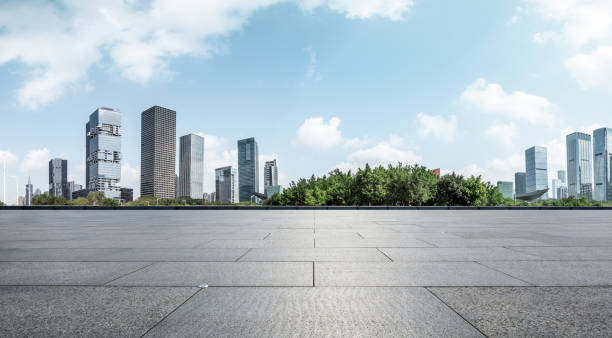 istock Empty square floor and modern city commercial architecture in shenzhen 972423438