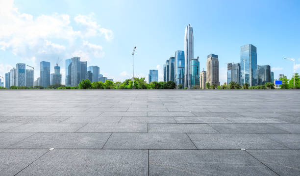 istock Empty square floor and modern city commercial architecture in shenzhen 972425526