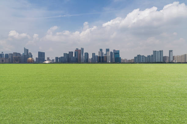 istock Panoramic skyline and modern business office buildings with empty road,empty concrete square floor 972425562