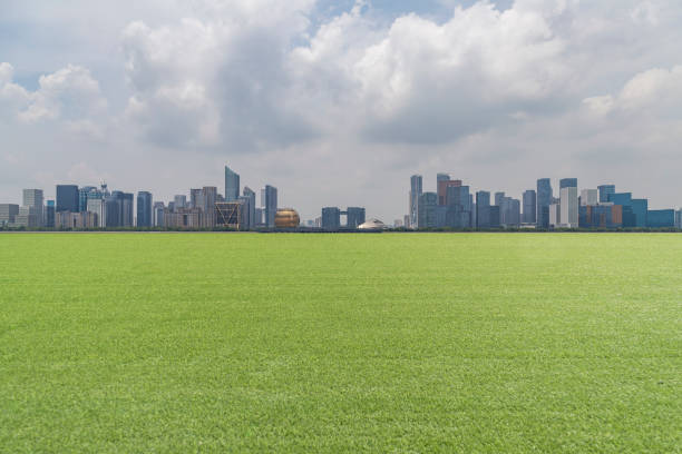 istock Panoramic skyline and modern business office buildings with empty road,empty concrete square floor 972425758