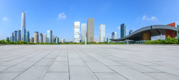 istock Empty square floor and modern city commercial architecture in shenzhen 972425888