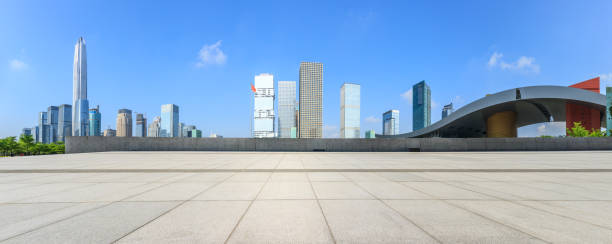 istock Empty square floor and modern city commercial architecture in shenzhen 972439906