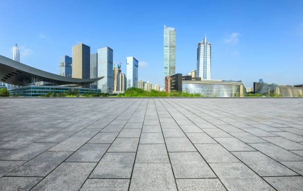 istock Empty square floor and modern city commercial architecture in shenzhen 972450782