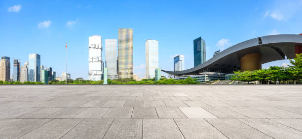 istock Empty square floor and modern city commercial architecture in shenzhen 972452834