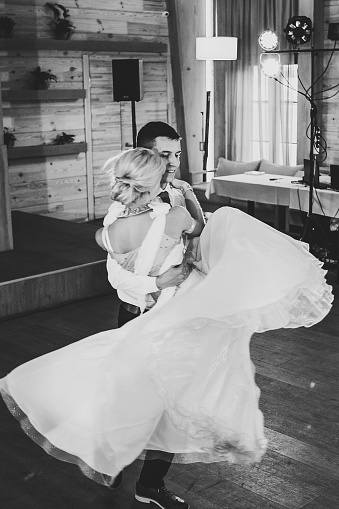 A bride and groom opening the dance floor