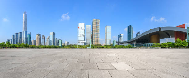 istock Empty square floor and modern city commercial architecture in shenzhen 972460988