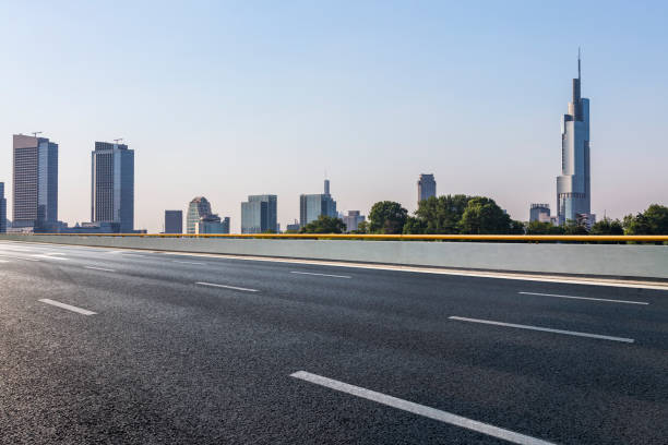 istock Panoramic skyline and modern business office buildings with empty road,empty concrete square floor 972465876