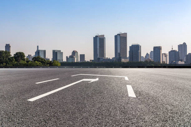 istock Panoramic skyline and modern business office buildings with empty road,empty concrete square floor 972468138