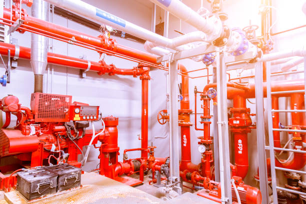 generador diesel de control fuego sistema rojo tubería y válvula de - fire extinguisher office safety protection fotografías e imágenes de stock