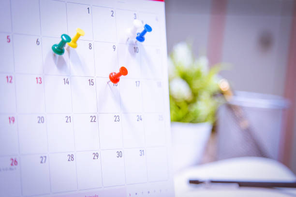 Calendar Event Planner is busy.calendar,clock to set timetable organize schedule,planning for business meeting or travel planning concept.