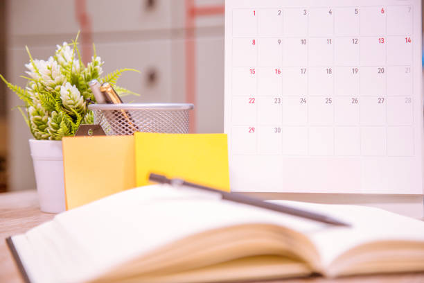 Calendar Event Planner is busy.calendar,clock to set timetable organize schedule,planning for business meeting or travel planning concept.