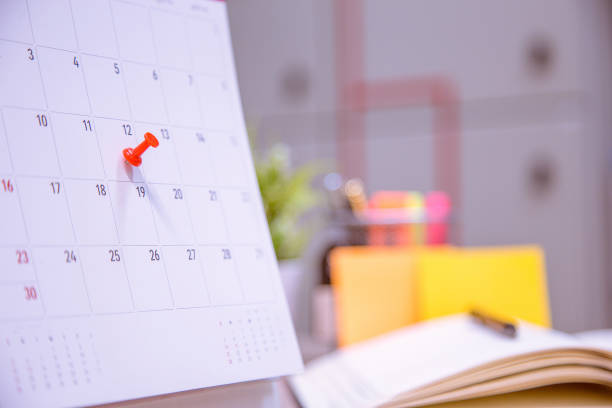 Calendar Event Planner is busy.calendar,clock to set timetable organize schedule,planning for business meeting or travel planning concept.