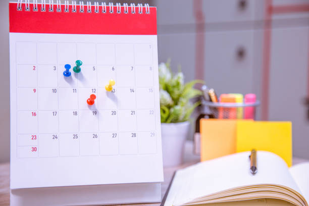 istock Calendar Event Planner is busy.calendar,clock to set timetable organize schedule,planning for business meeting or travel planning concept. 972503812