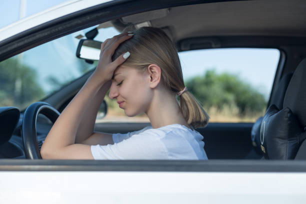 istock Unhappy woman in car 972509220