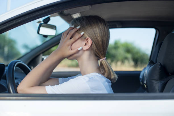 istock Unhappy woman in car 972509272