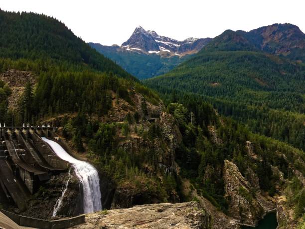 istock Mountain peak with a dam in the foreground 972509314