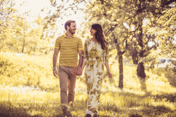 istock Happy middle age couple in nature. 972519612