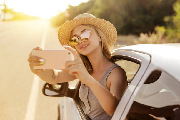 istock Young woman makes photographs 972529246