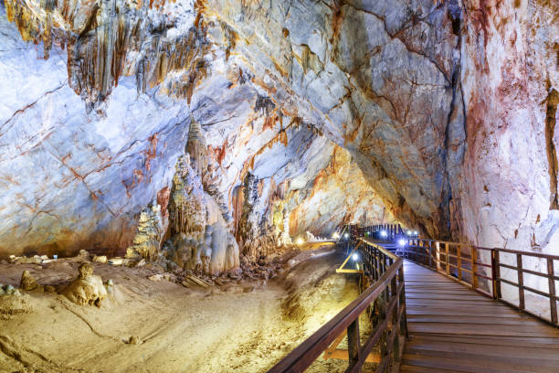 istock Wooden walkway through underground chamber inside Paradise Cave 972529464