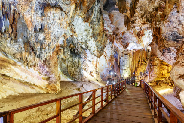 istock Wooden walkway among wonderful stalactites inside Paradise Cave 972529662