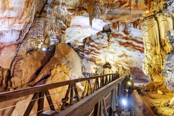 istock Amazing walkway inside Paradise Cave (Thien Duong Cave), Vietnam 972529776