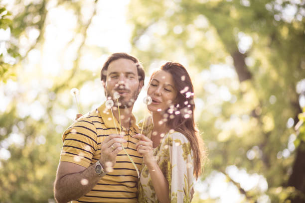 istock Spring joy. Couple in nature. 972532064
