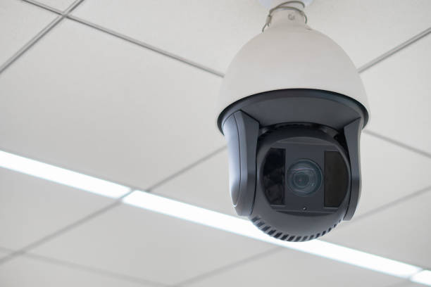 istock Closed-circuit television,Security CCTV camera or surveillance system in background of Checkpoint - Body and bag Luggage Scan Machine ,Secure Airport Check In,vintage color 972534762