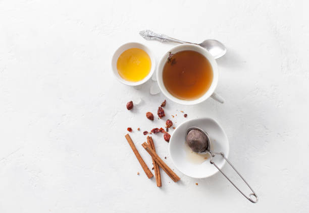 istock Tea in a Cup with cinnamon, honey and rosehip. Copy space text 972541300