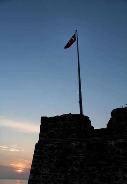istock Turkish flag sunset and castle 972544262