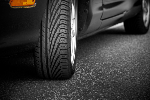 View of a car tire with sufficient profile on a used car