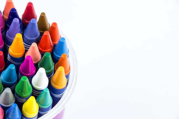 istock Colorful crayons in cup,white background,close up 972572748