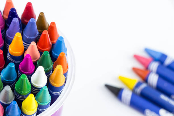 istock Colorful crayons in cup,white background,close up 972572750