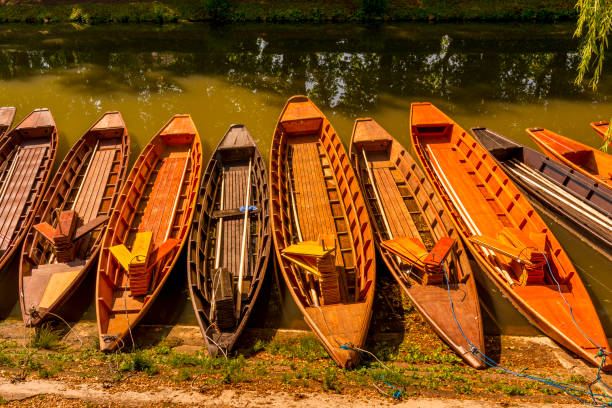 istock wooden boats in a row 972587724