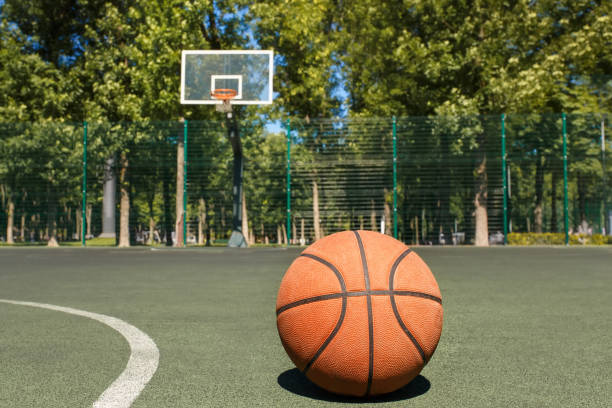 istock basketball ball on the outdoors court 972596334