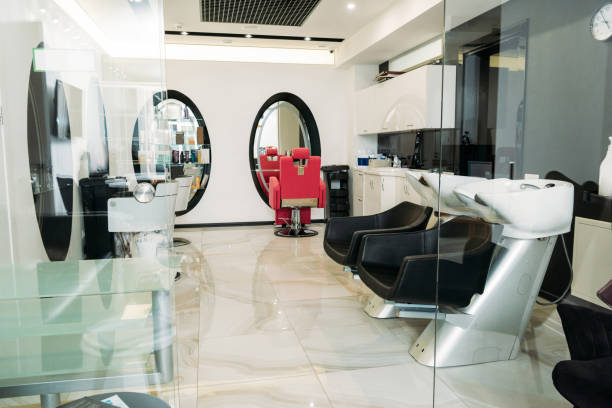 istock empty modern hair salon with equipment 972596382