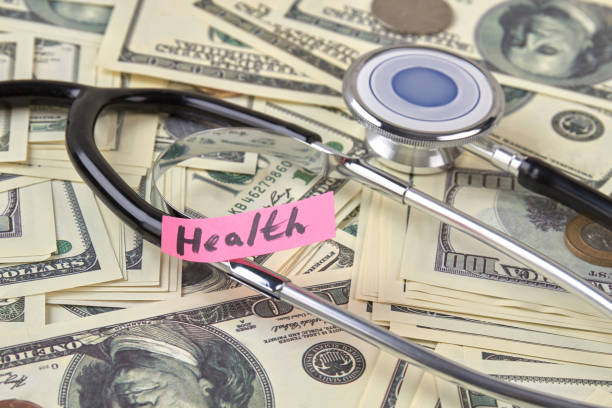 istock Dollars and stethoscope, close up. 972617188