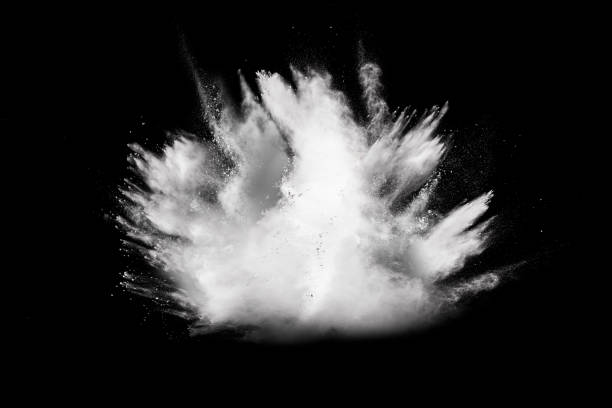 istock Launched white powder splash on black background. Bizarre forms of of white powder explosion cloud against dark background. 972620848